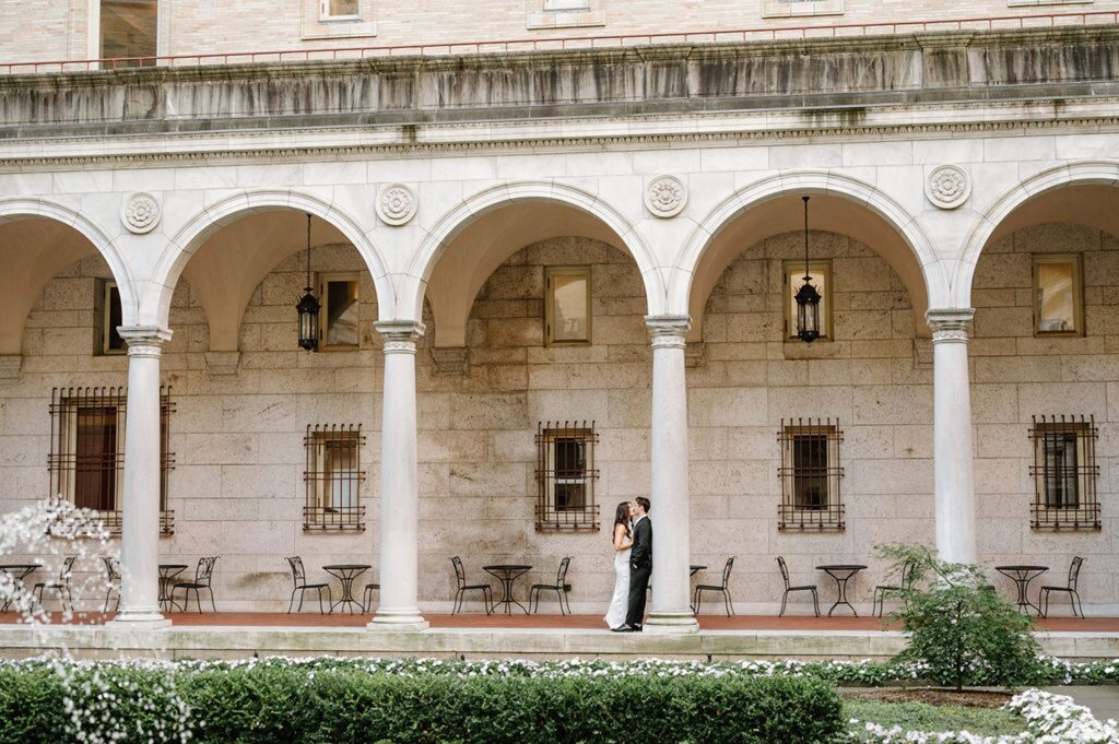 Engagement photos in the courtyard of the Boston Public Library