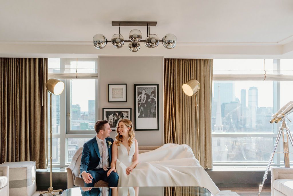 Couple getting ready portrait in hotel room for State Room wedding