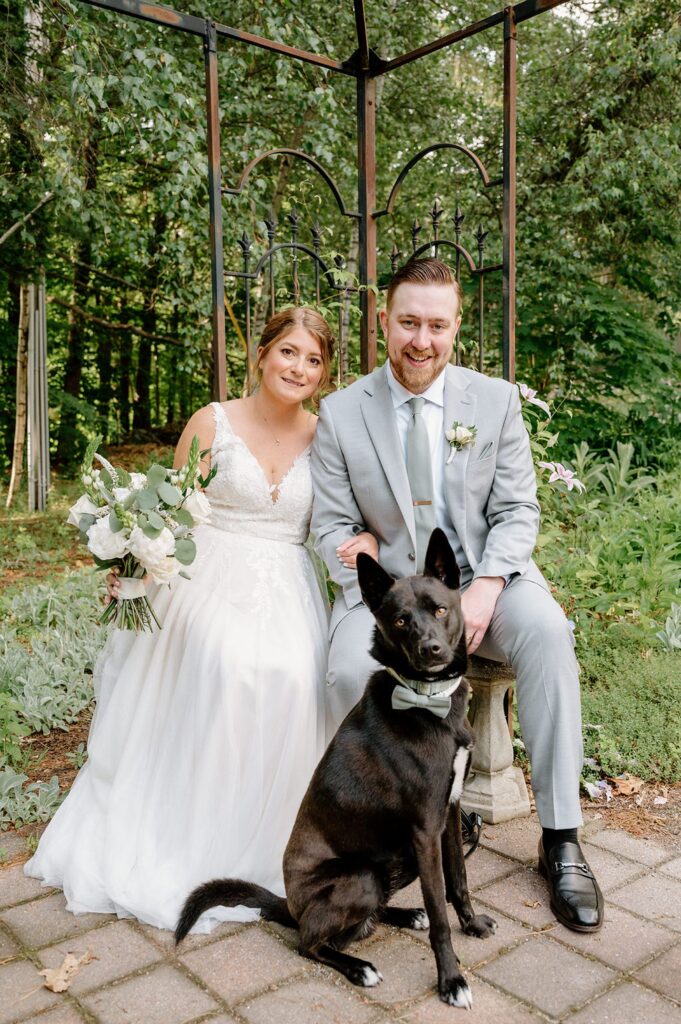 Bride and groom portrait with their dog