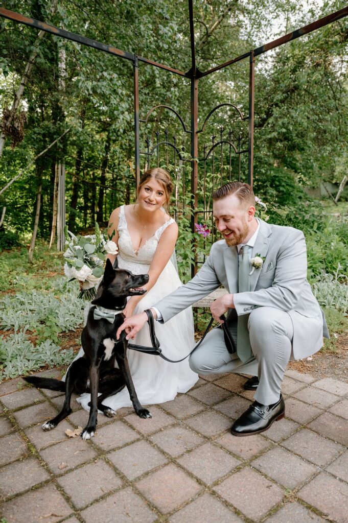 Bride and groom portrait with their dog 