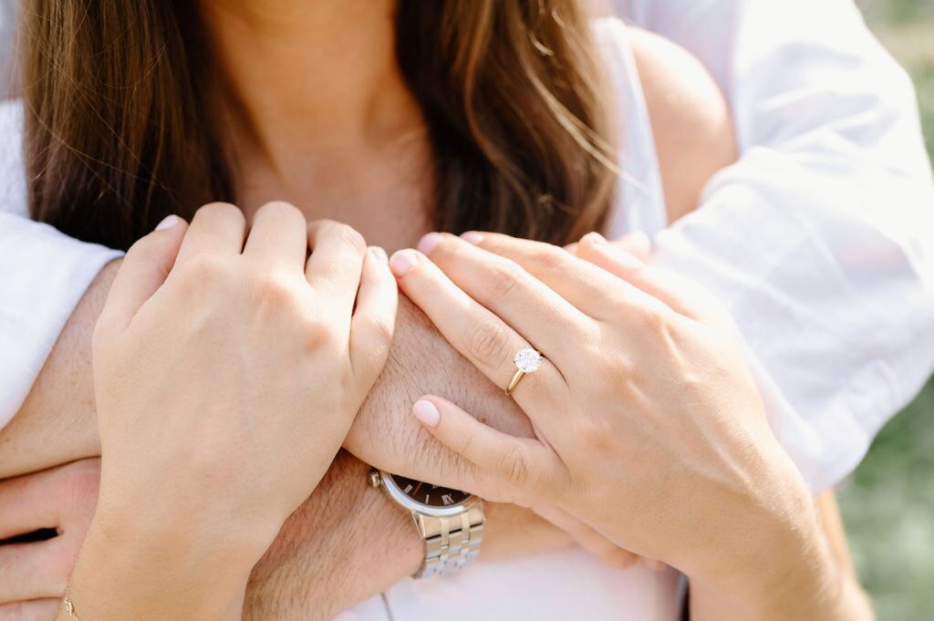 Close up of engagement ring during Crane Beach engagement photos 