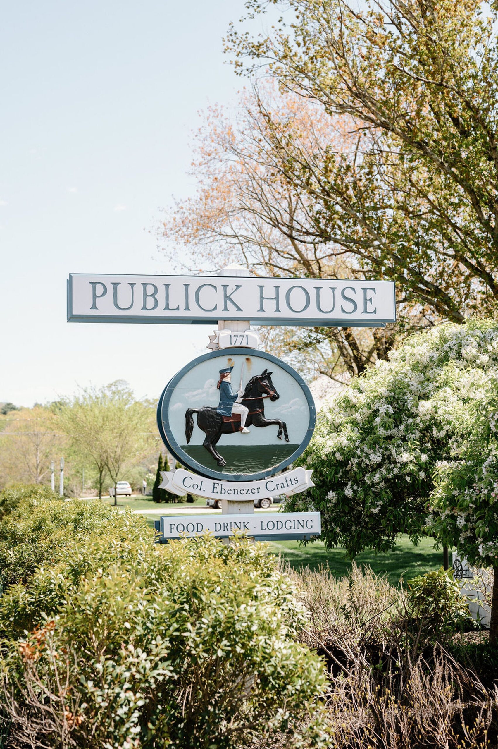 the sign for the Publick House Historic Inn entrance. 