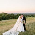 Sunset wedding portraits at Granite Links overlooking Boston skyline