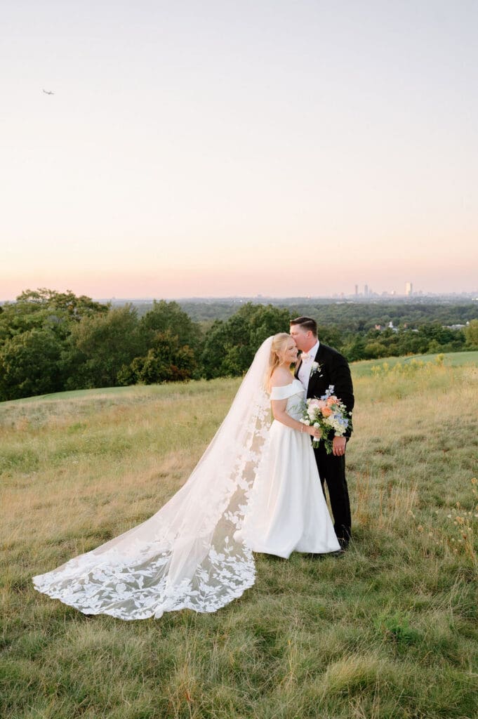 Sunset wedding portraits at Granite Links overlooking Boston skyline
