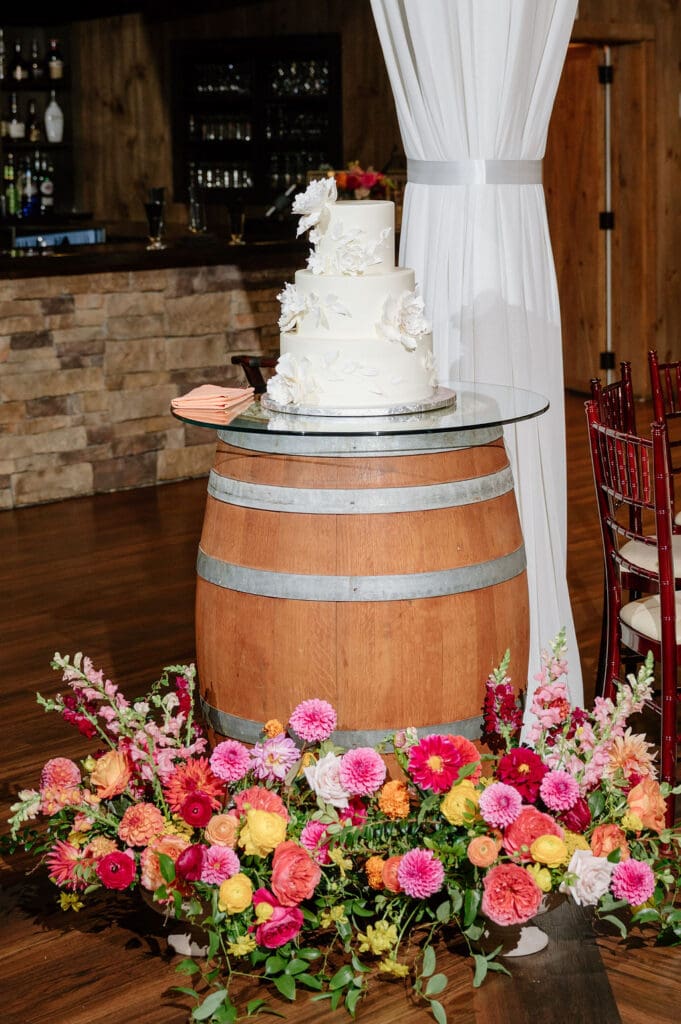 Wedding cake with floral details at Birch Wood Vineyards wedding in Derry New Hampshire