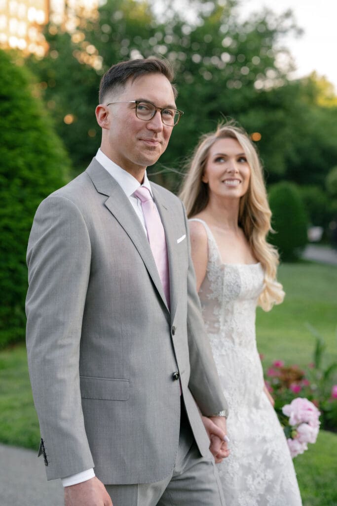 Candid wedding portrait walking through the Boston Public Garden