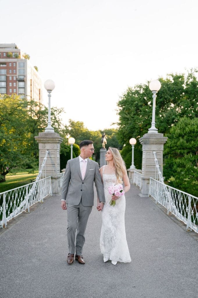 Candid wedding portrait walking through the Boston Public Garden