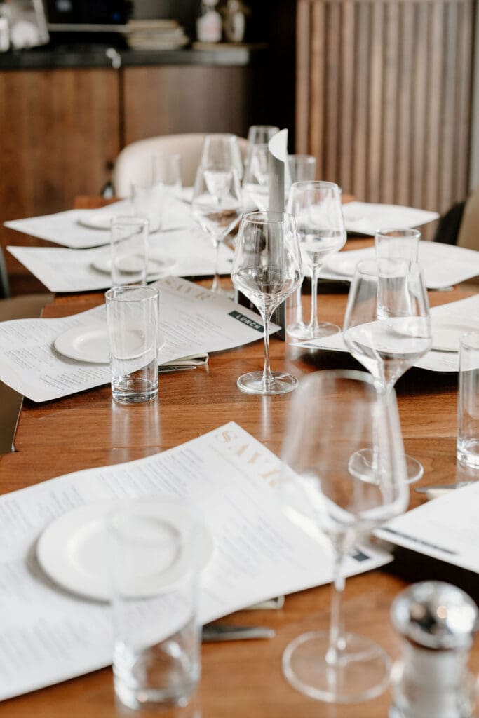 Couple celebrating their Boston City Hall wedding over lunch