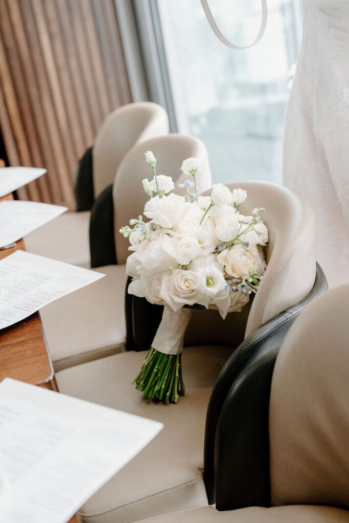 Couple celebrating their Boston City Hall wedding over lunch