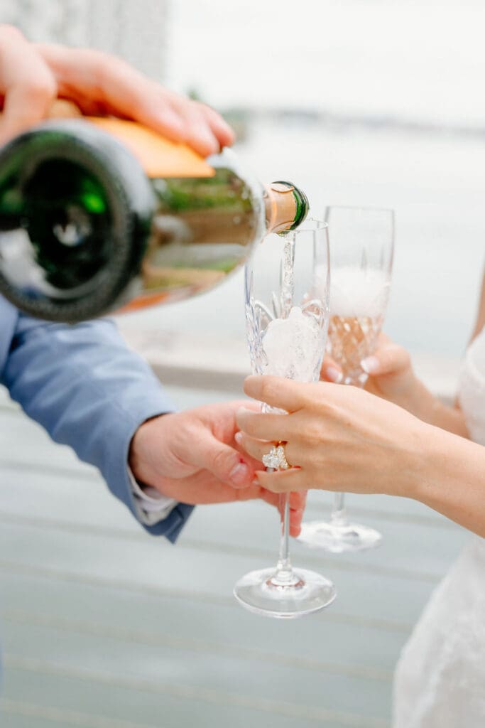 Champagne spray at SAVR Boston after an intimate wedding